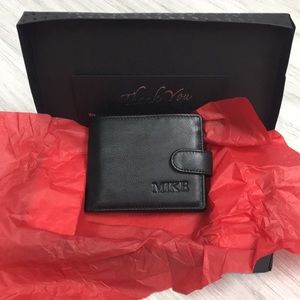 Black leather wallet w. Monogram “Mike”